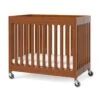 Foundations Compact Boutique™ Folding Crib,slatted Casters Foam Mattress,cherry -Home Furnishing Store 314253 MainProductImage Lg